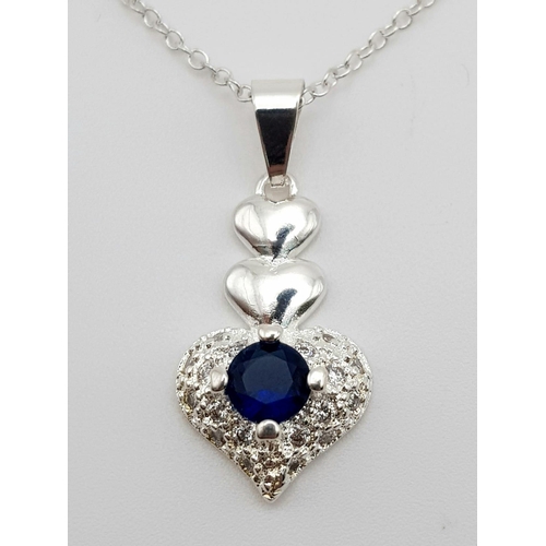 1344 - A 925 Silver Blue and White Stone Heart Pendant on a 925 Silver Disappearing Necklace. 3cm and 44cm