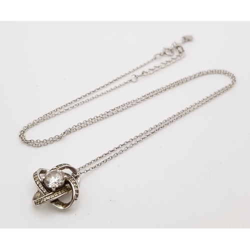 1384 - A 925 Silver White Stone Twist Pendant on a 925 Silver Disappearing Necklace. 2cm and 50cm.