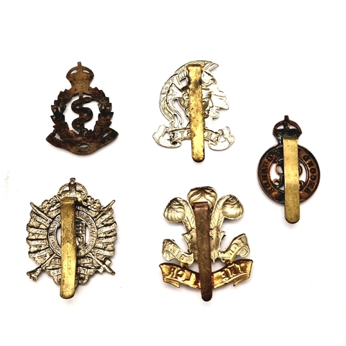 657 - 10 x British Army Cap Badges.