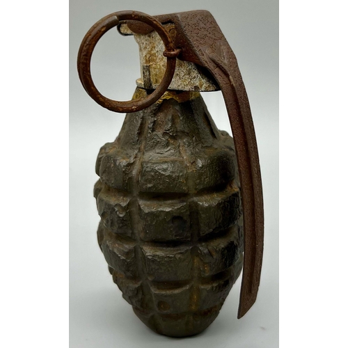 776 - INERT WW2 US Pineapple Grenade. Found in the Ardennes Forest, Belgium.