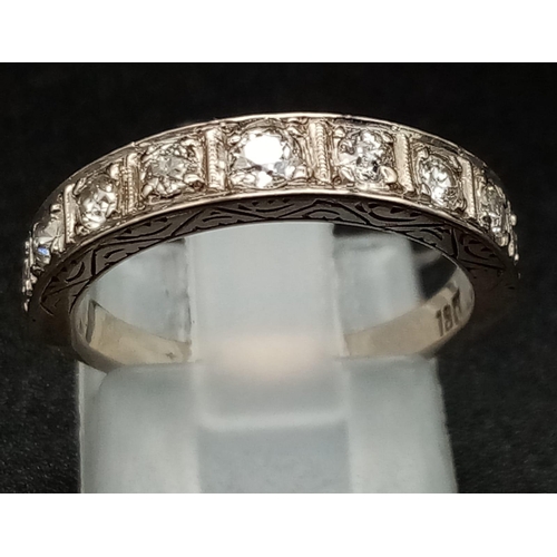 110 - A Vintage 18K White Gold Diamond Half-Eternity Ring. Nine diamonds. Size K 1/2. Total weight - 3.6g