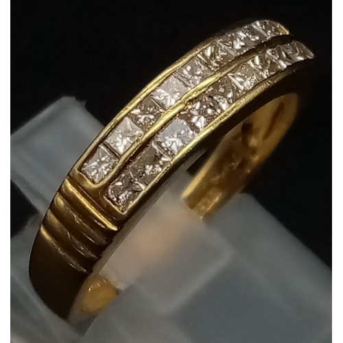 124 - An 18K Yellow Gold Half-Eternity Diamond Ring. 20 Princess cut diamonds - 0.6ct. Size N. Total weigh... 