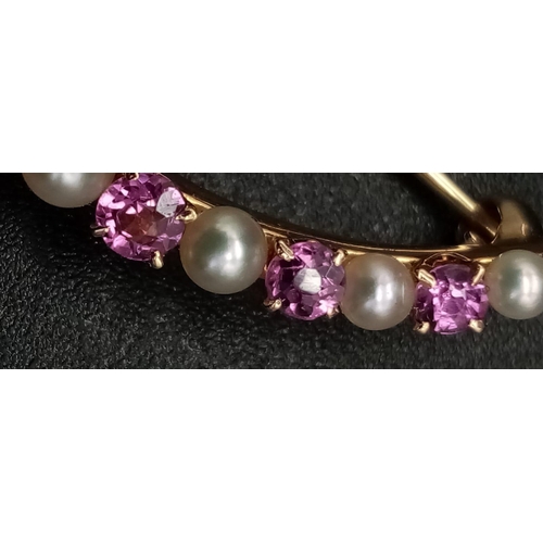 946 - An Edwardian High-Karat Gold Pink Sapphire and Pearl Brooch. 4cm. 2.65g total weight.