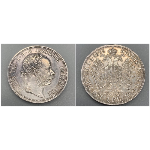 1128 - An 1873 Austrian Silver One Florin Coin. Excellent definition.