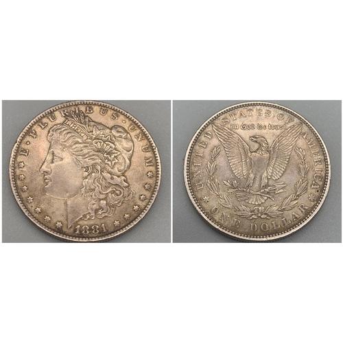 1163 - An 1881 USA Silver One Dollar Coin. Please see photos for conditions.