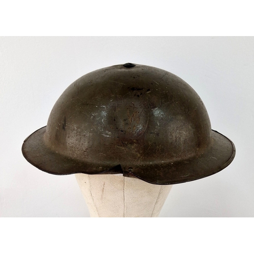 783 - WW2 British MK II Helmet with Shrapnel Damage. This was found in a French Flea Market near Ouistreha... 