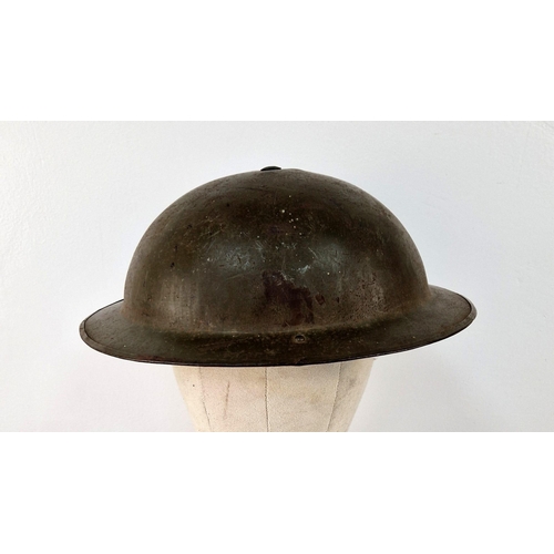 783 - WW2 British MK II Helmet with Shrapnel Damage. This was found in a French Flea Market near Ouistreha... 