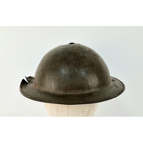 783 - WW2 British MK II Helmet with Shrapnel Damage. This was found in a French Flea Market near Ouistreha... 