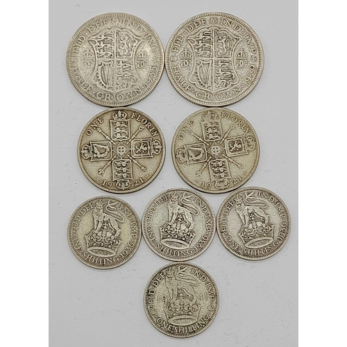 1056 - A Parcel of 8 Pre-1947 Silver Coins Comprising; 2 x Half Crowns (1929, 1935), 2 x Florins 1921, 4 Sh... 