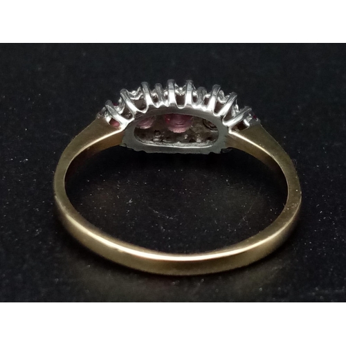 402 - A 9 K yellow gold ring with an amethyst (0.43 carats) and diamond (0.08 carats) cluster. Ring size: ... 