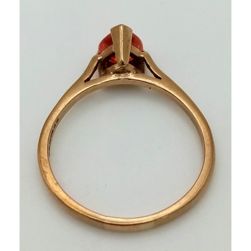 437 - A 9K yellow gold ring with a rare heart shaped mandarin garnet. Ring size: Q, weight: 2.5 g.