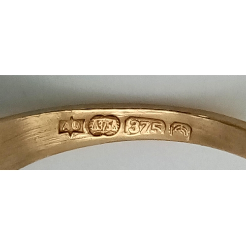 1052 - A rare 9K yellow gold 