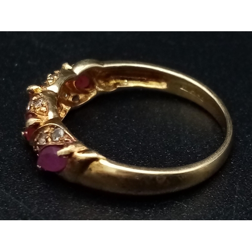 1241 - A 9K yellow gold ring with four marquis cut rubies alternating with diamonds. Ring size: N, weight: ... 