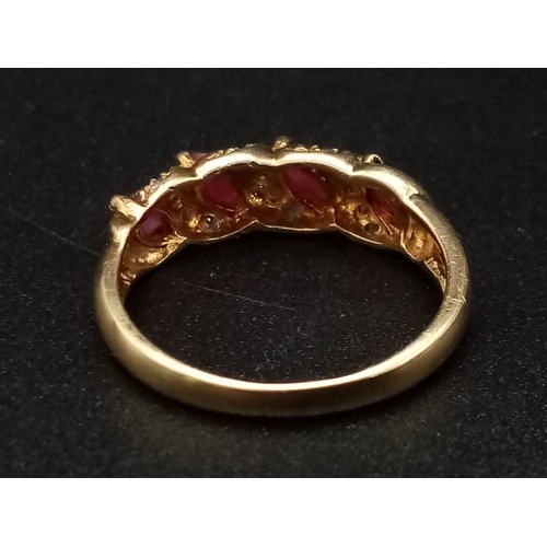 1241 - A 9K yellow gold ring with four marquis cut rubies alternating with diamonds. Ring size: N, weight: ... 