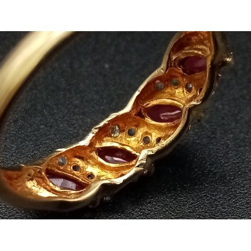 1241 - A 9K yellow gold ring with four marquis cut rubies alternating with diamonds. Ring size: N, weight: ... 