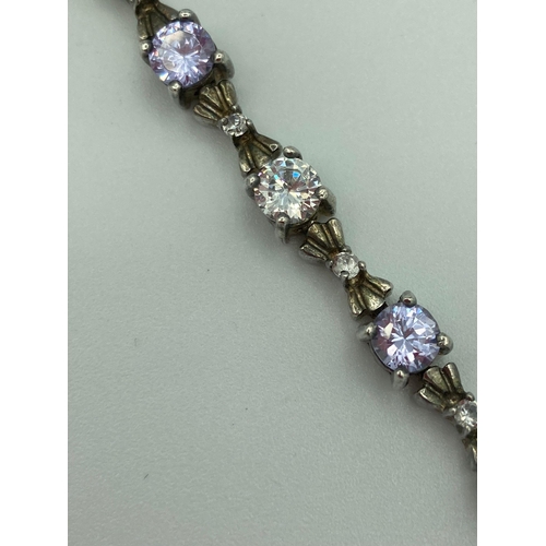 21 - Beautiful vintage SILVER GEM SET TENNIS BRACELET Having sparkling white quartz and violet quartz gem... 