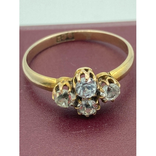 77 - 9k GOLD and AQUA RING having four sparkling round cut AQUA GEMSTONES mounted to top. Complete with r... 