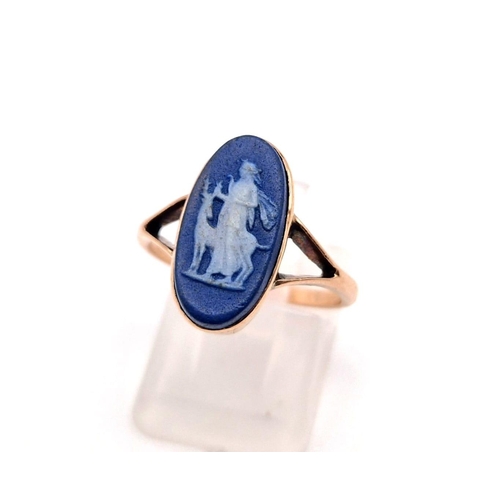 1061 - A vintage, 9K rose gold ring with a white on blue cameo depicting Artemis - the Greek goddess of hun... 