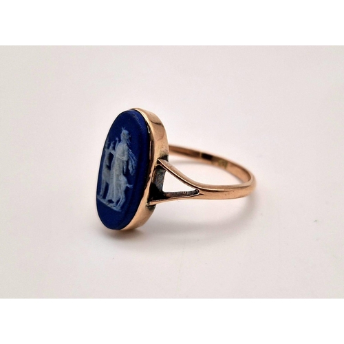 1061 - A vintage, 9K rose gold ring with a white on blue cameo depicting Artemis - the Greek goddess of hun... 