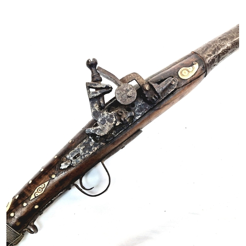 372 - An Antique Flint Lock Bone Inlaid Jazail Rifle, (Most Likely Afghan). 163cm Long. Action working but... 