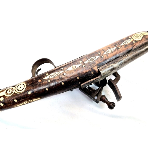 372 - An Antique Flint Lock Bone Inlaid Jazail Rifle, (Most Likely Afghan). 163cm Long. Action working but... 