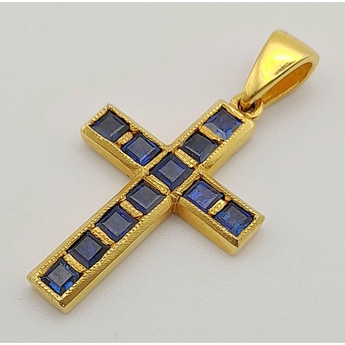 1387 - 18k Yellow Gold Sapphire Set Cross. 3.7g