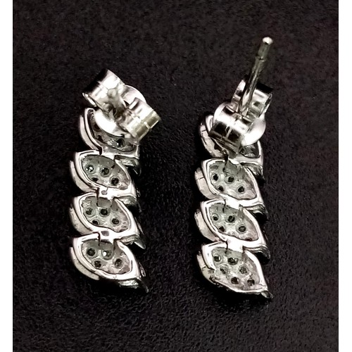 1347 - 9K WHITE GOLD DIAMOND DROP EARRINGS. 0.40CT 1.8G TOTAL WEIGHT.