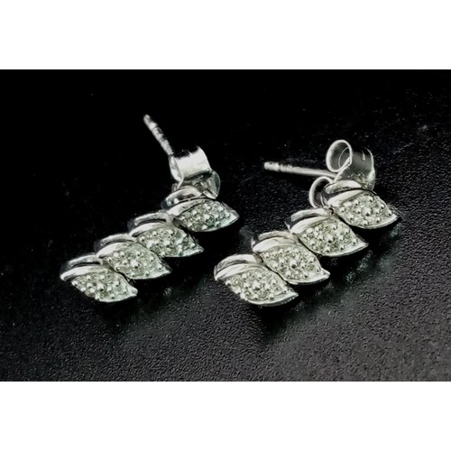 1347 - 9K WHITE GOLD DIAMOND DROP EARRINGS. 0.40CT 1.8G TOTAL WEIGHT.