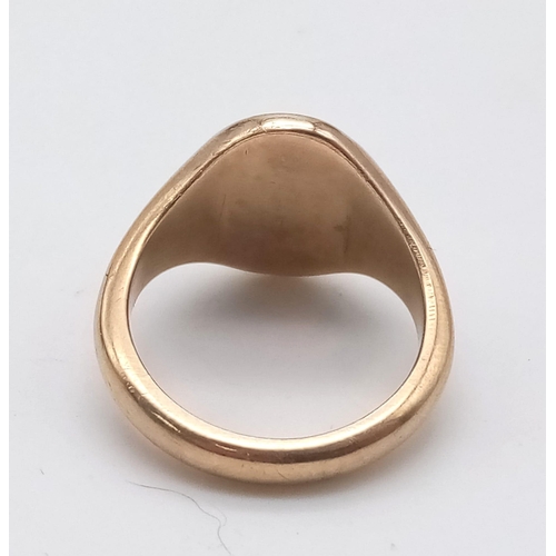 1164 - 9K YELLOW GOLD OVAL SIGNET RING - 9G TOTAL WEIGHT. SIZE P