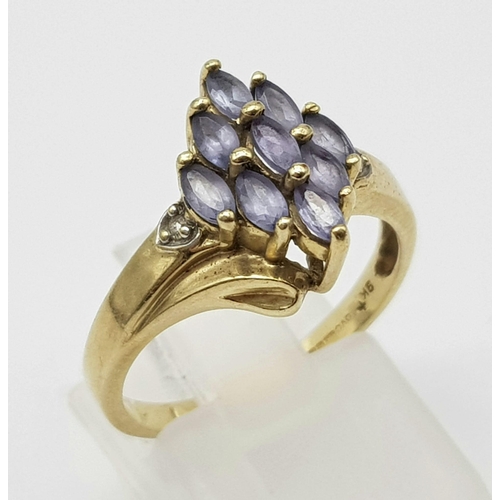 1424 - 9K YELLOW GOLD DIAMOND & IOLITE FANCY CLUSTER RING. 3G TOTAL WEIGHT. SIZE O