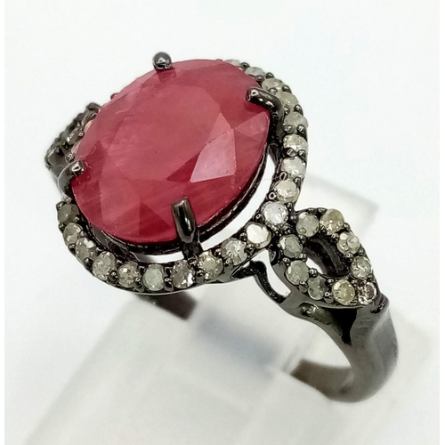 1286 - 925 Silver Ruby Ring with Diamond Accents. Total Weight 3.36grams. Size L.