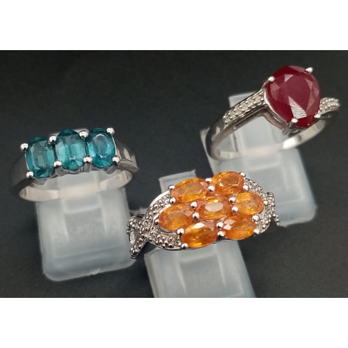 1278 - Three 925 Silver Gemstone Rings. Orange, blue and red topaz. 1 x P, 2 x R.