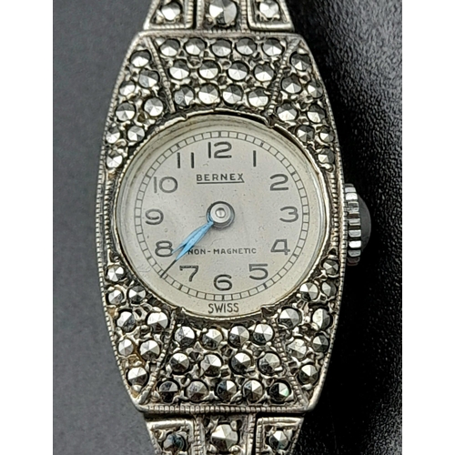 1318 - An Antique Bernex Silver and Marcasite Watch Case and Part Bracelet. Mechanical movement in working ... 