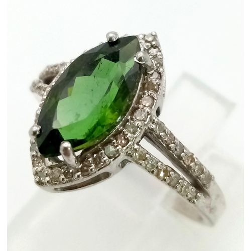 1453 - 925 Sterling Silver Diamond and Emerald Ring. Total Weight 2.9grams. Size M. 7.45ct Emerald. 1.55ct ... 