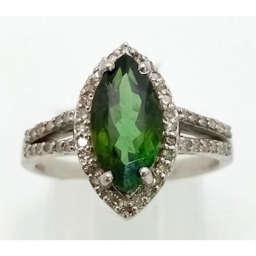 1453 - 925 Sterling Silver Diamond and Emerald Ring. Total Weight 2.9grams. Size M. 7.45ct Emerald. 1.55ct ... 