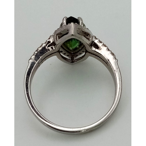 1453 - 925 Sterling Silver Diamond and Emerald Ring. Total Weight 2.9grams. Size M. 7.45ct Emerald. 1.55ct ... 