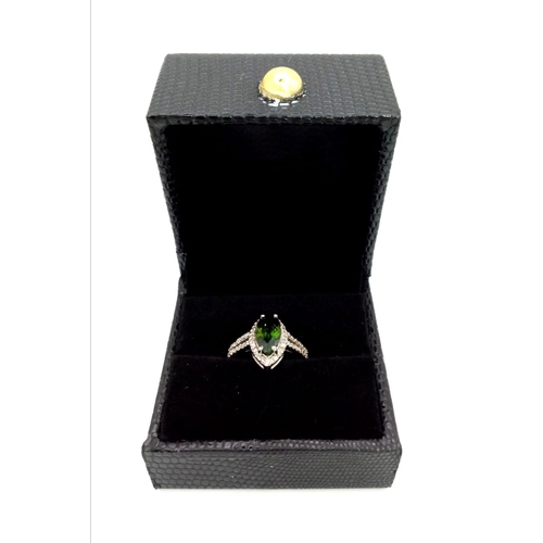 1453 - 925 Sterling Silver Diamond and Emerald Ring. Total Weight 2.9grams. Size M. 7.45ct Emerald. 1.55ct ... 