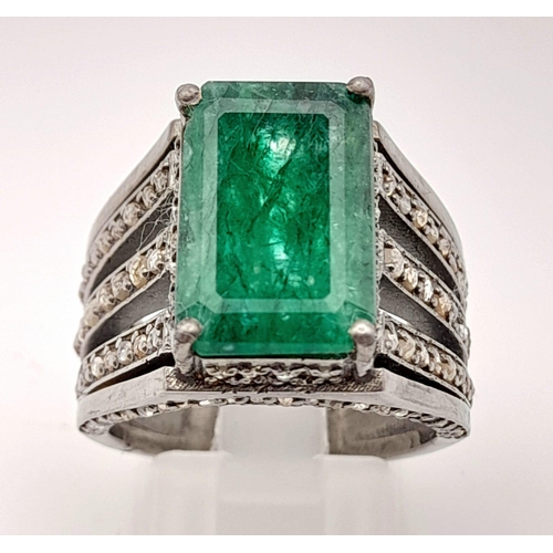 1457 - 925 Sterling Silver Diamond Emerald Ring. Total Weight 10.09grams. Size Q. 7.45ct Emerald. 1.55ct Di... 