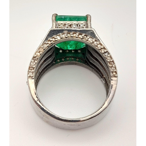 1457 - 925 Sterling Silver Diamond Emerald Ring. Total Weight 10.09grams. Size Q. 7.45ct Emerald. 1.55ct Di... 