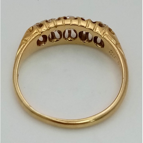 1047 - An 18K yellow gold ring with five clean diamonds. Ring size: N1/2, weight: 3.33 g.