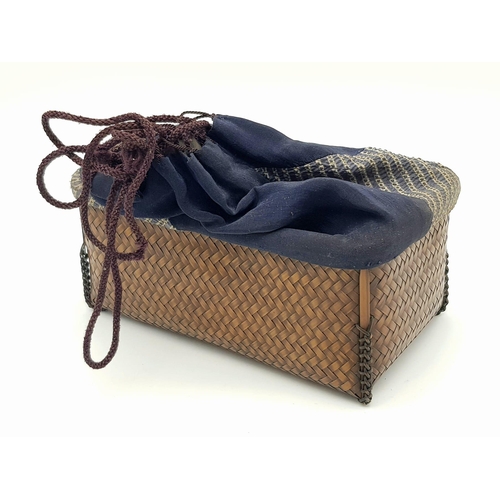 1253 - A JAPANESE IKEBANA BASKET HANDBAG CIRCA 1880 ,MADE OF INTRICATELY WOVEN SUZUTAKI SMOKED OILED BAMBOO... 