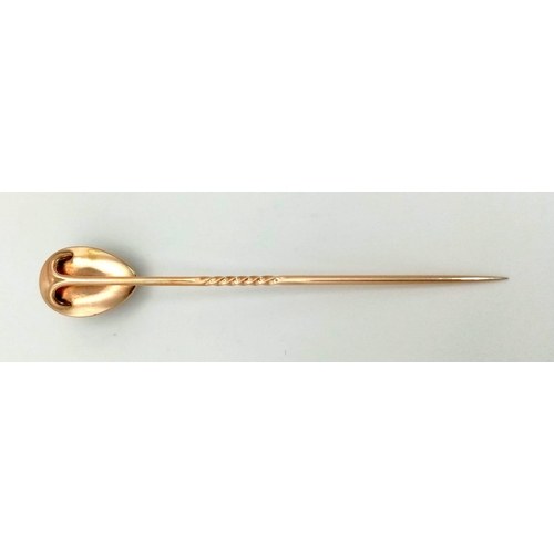 1293 - A high carat stick pin  with tear drop shaped garnet. Length: 7.5 cm, weight: 4 g.