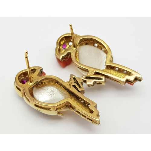 212 - A PAIR OF BEAUTIFUL SEAMAN SCHWEPPES DIAMOND AND OPEL EARRINGS WITH RUBY EYES SET IN 18K GOLD .  8gm... 