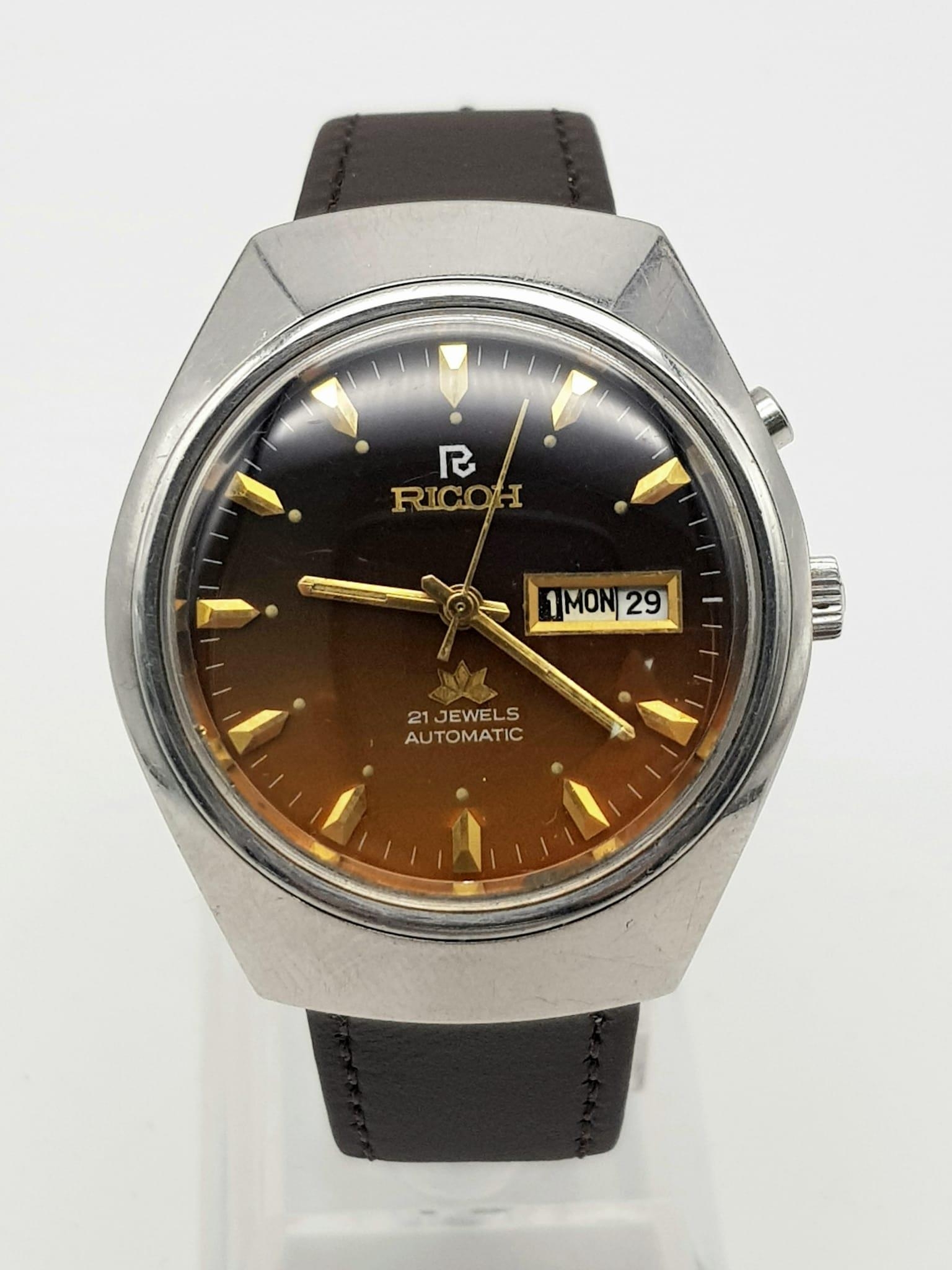 A Vintage Ricoh 21 Jewel Automatic Gents Watch. Brown leather