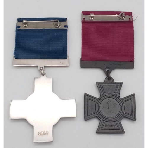 459 - Replica Victoria Cross and George Cross. These are good quality ‘museum’ replicas, each embossed wit... 