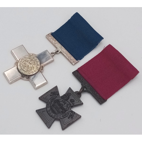 459 - Replica Victoria Cross and George Cross. These are good quality ‘museum’ replicas, each embossed wit... 