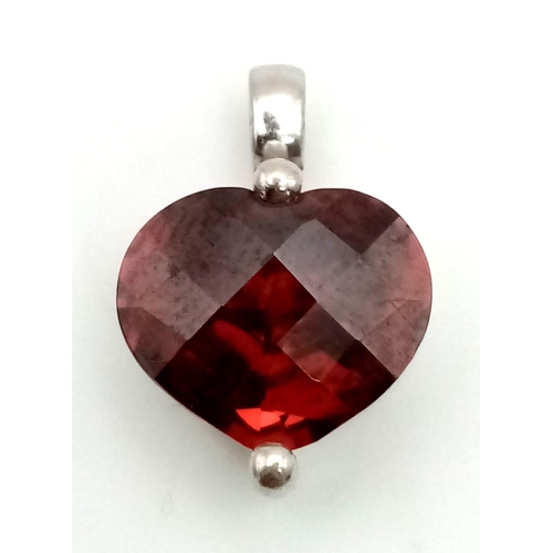 814 - A sterling silver lot with red cubic zirconia including a pair of heart shaped earrings, a heart sha... 