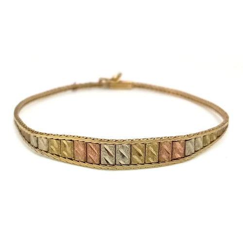 1508 - A Vintage 9k Three-Colour Gold Bracelet. 18cm. 4.74g