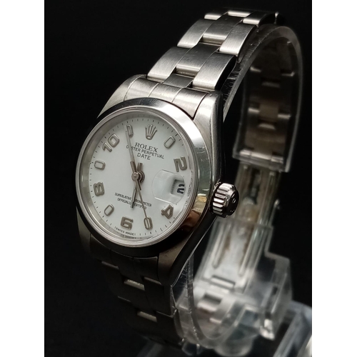 1520 - A Rolex Oyster Perpetual Datejust Ladies Watch. Stainless steel strap and case - 26mm. White dial wi... 