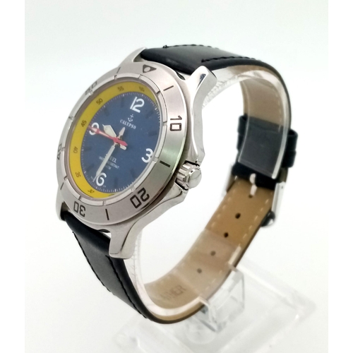 1569 - A Calypso Gents watch. Leather strap. Stainless steel case - 40mm. Blue and yellow dial. In working ... 